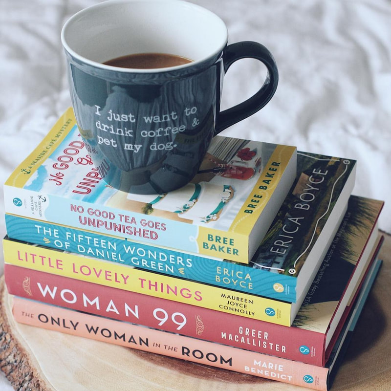 Book Stack including: No Good Tea Goes Unpunished by Bree Baker, The Fifteen Wonders of Daniel Green by Erica Boyce, Little Lovely Things by Maureen Joyce Connolly, Woman 99 by Greer Macallister, and The Only Woman in the Room by Marie Benedict